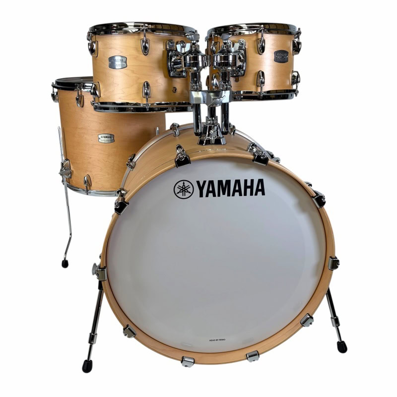 Yamaha acoustic drum kit with natural wood finish, perfect for professional drummers and studio reco.