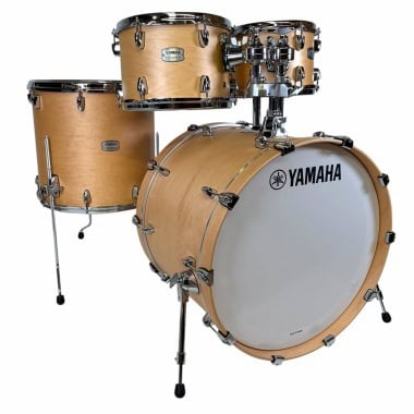 Yamaha drum kit with natural wood finish, perfect for professional drummers and studio use.