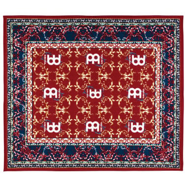 Small oriental-style drum rug with intricate red, blue, and gold patterns.