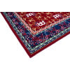 Small oriental drum rug with intricate red, blue, and gold patterns for drumming setups.
