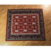 Small oriental drum rug with intricate patterns and logo design for drummers.