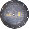 Rusted drum practice pad with triple layer construction for drumming practice and durability.