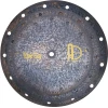 Rusted drum practice pad with triple layer construction for drumming practice and durability.
