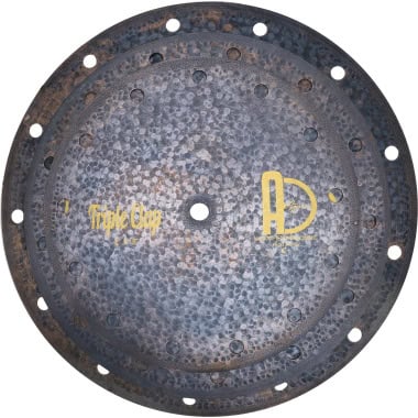Rusted drum practice pad with triple layer construction for drumming practice and durability.