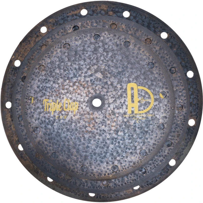 Rusted drum practice pad with triple layer construction for drumming practice and durability.