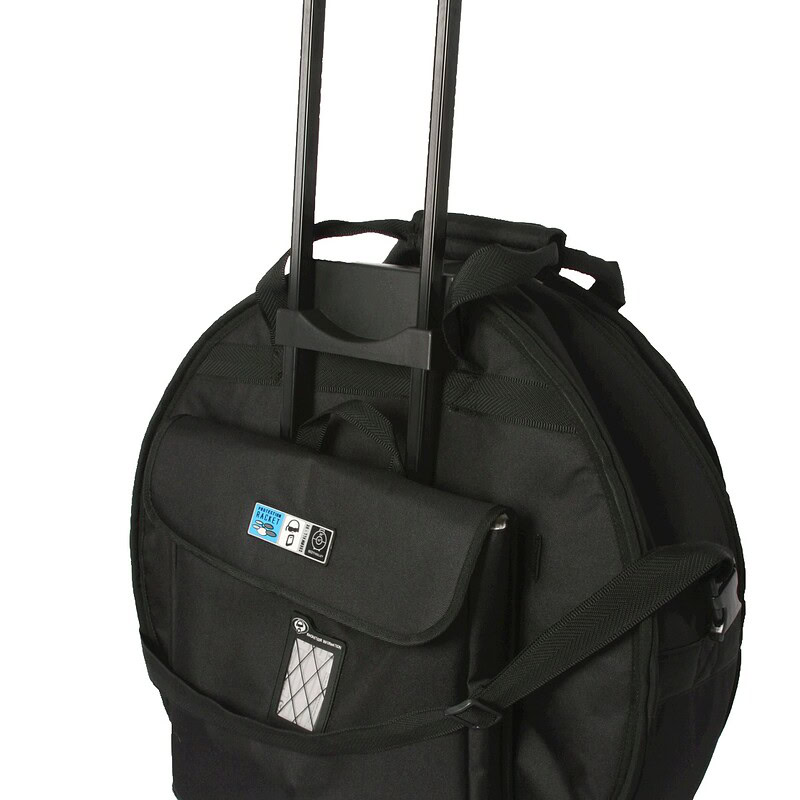 Rolling drum bag with extendable handle for musicians on the go.
