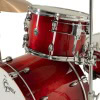 Red Gretsch Catalina Club drum kit with chrome hardware and cymbals.