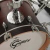 Close-up of Gretsch Catalina Club Micro drum kit with hardware and logo.