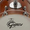 Close-up of Gretsch Catalina Club Micro drum shell with logo and hardware.
