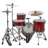 Red drum kit with cymbals and hardware for drumming.