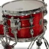 Red drum shell with chrome hardware and white drumhead.