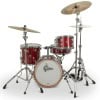 Red drum kit with cymbals on a white background for drumming enthusiasts.