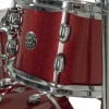 Close-up of red glitter Gretsch Catalina drum shell with chrome hardware.