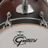 Close-up of Gretsch Catalina Club Jazz drum with logo and hardware details.