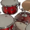 Red Gretsch Catalina Club drum kit with chrome hardware and cymbals.