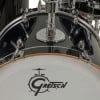 Close-up of Gretsch Catalina Club drum with black finish and logo.