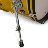 Close-up of drum stand and part of yellow satin flame drum kit.