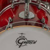 Close-up of Gretsch Catalina Club drum with glossy crimson burst finish.