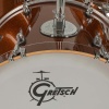 Close-up of a Gretsch Catalina Club drum with bronze sparkle finish.