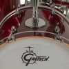 Close-up of Gretsch Catalina Club drum with dark cherry sparkle finish.