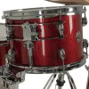 Red glitter shell drum with hardware and stand for drumming.