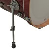 Close-up of Gretsch Catalina Club drum with chrome hardware and dark cherry sparkle finish.