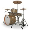 Drum kit with natural wood finish and cymbals on stands.