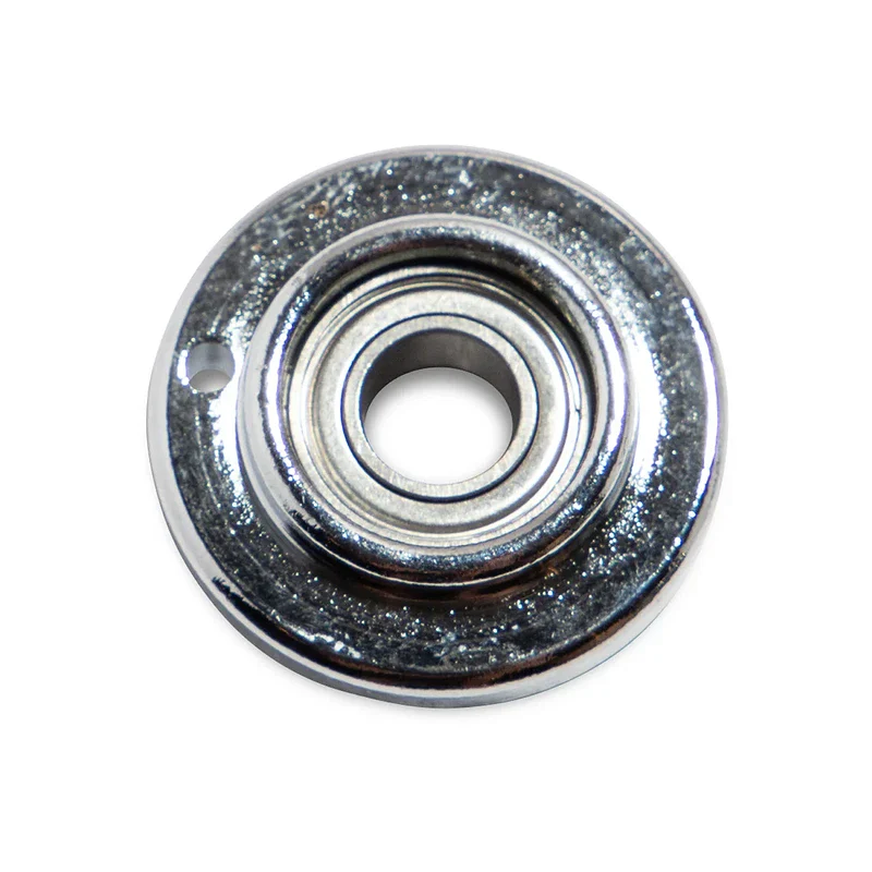 Close-up of a metal snare drum component for drumming equipment.