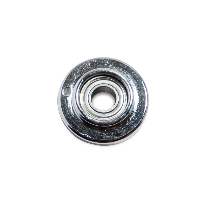 Close-up of a metal snare drum component for drumming equipment.
