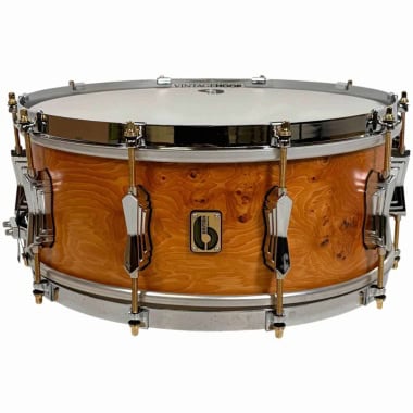 Snare drum by British Drum Company, model 'The Archer', 14x6 inches, with a natural wood finish.