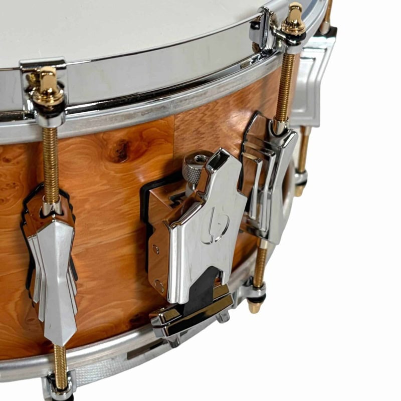 Snare drum from British Drum Co 'The Archer' series, 14x6 inches, with polished wood finish and chro.