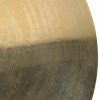 Close-up of a drumstick with drum kit in the background, perfect for drumming enthusiasts.