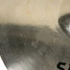 Cymbal close-up showing detailed grooves and reflections, ideal for drumming and percussion enthusia.