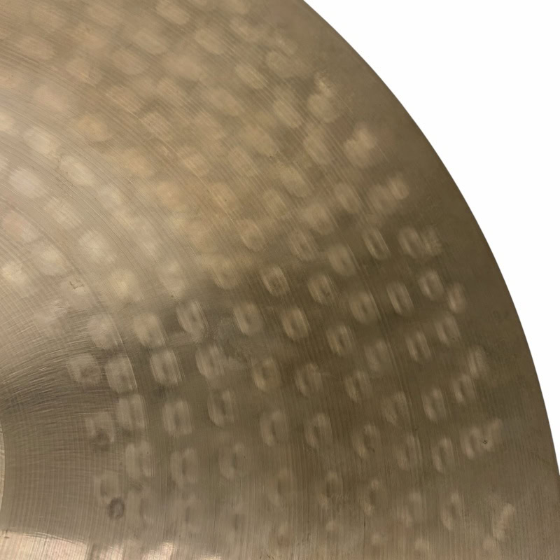 Close-up of a cymbal with Drummers Only logo, highlighting percussion equipment.