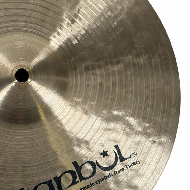 Close-up of a cymbal with Drummers Only logo, highlighting professional drum equipment.