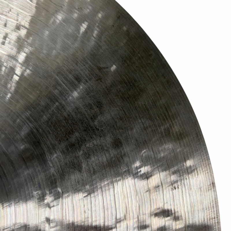 Close-up of a drum cymbal with Drummers Only logo, highlighting percussion equipment.