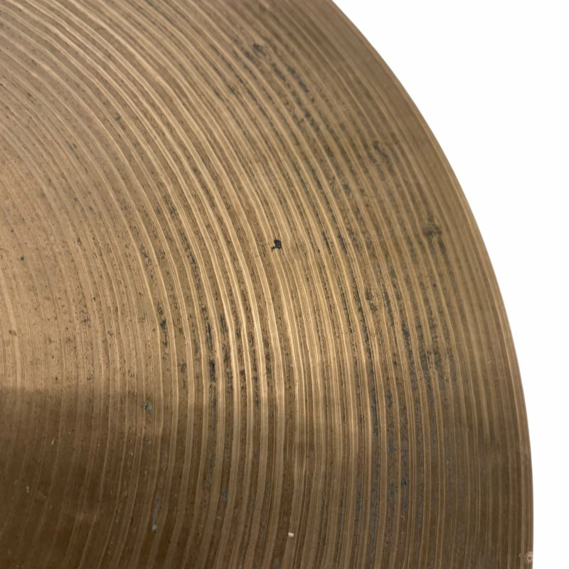 Cymbal close-up showing detailed grooves and texture, ideal for drummers and percussion enthusiasts.