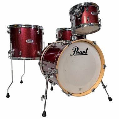 High-quality Pearl drum kit with red finish, perfect for drummers and music enthusiasts.