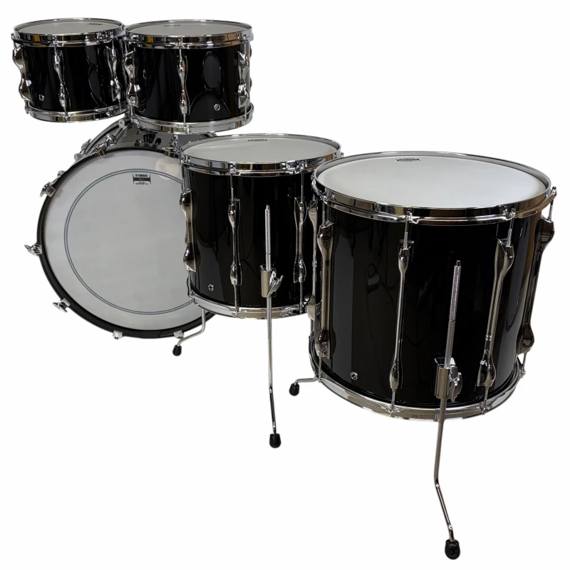 Black drum kit with bass, snare, and tom drums for drumming enthusiasts.