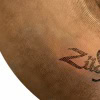 Close-up of a bronze cymbal with detailed grooves, perfect for drummers and percussion enthusiasts.