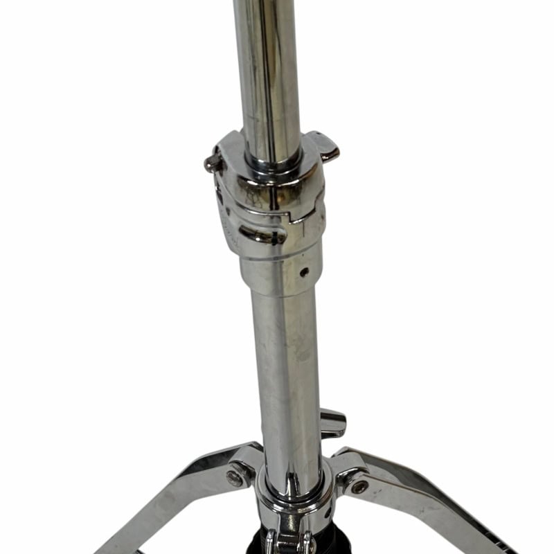 Close-up of a chrome drum hardware stand for drummers.