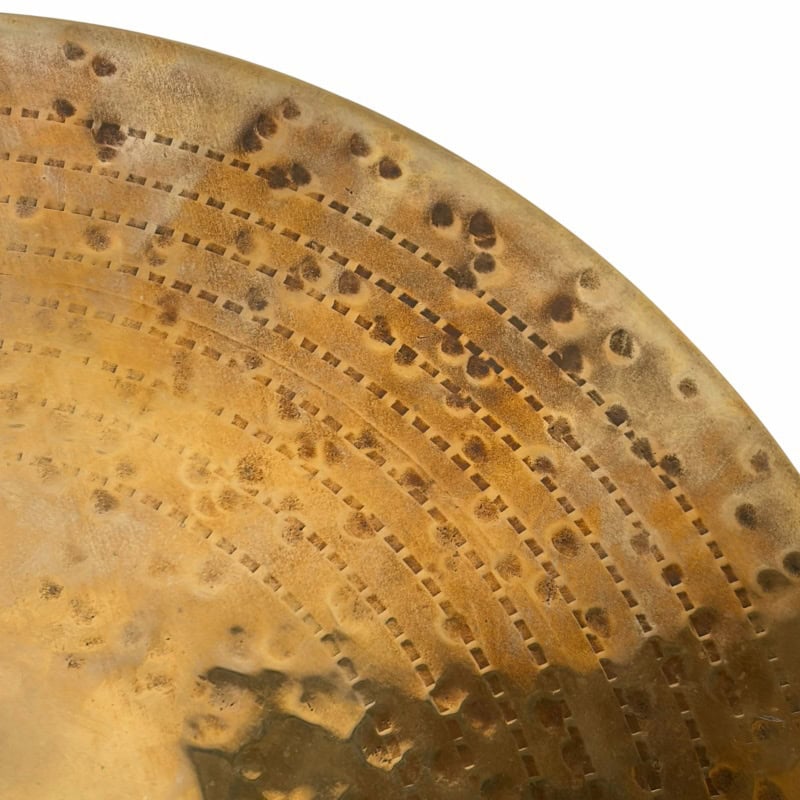 Vintage cymbal with detailed hammering and lathing patterns, ideal for drummers and percussion enthu.
