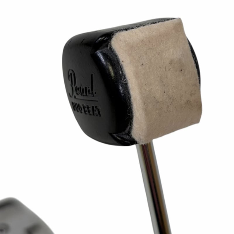 Mallet for percussion instruments, black head with beige felt, used for drumming and percussion.