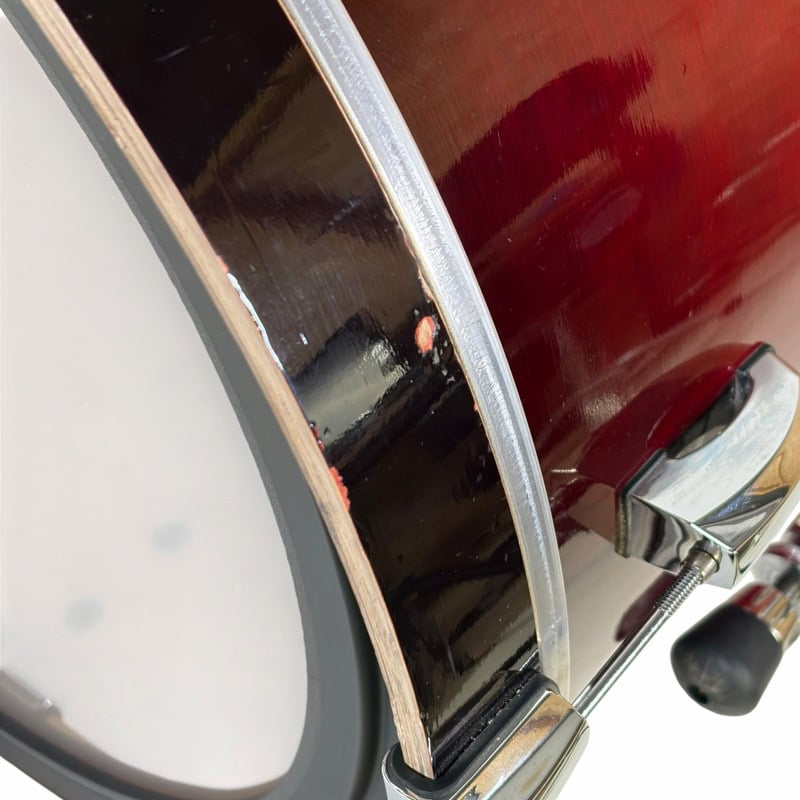 Close-up of a drum kit with detailed focus on drum shell and hardware.