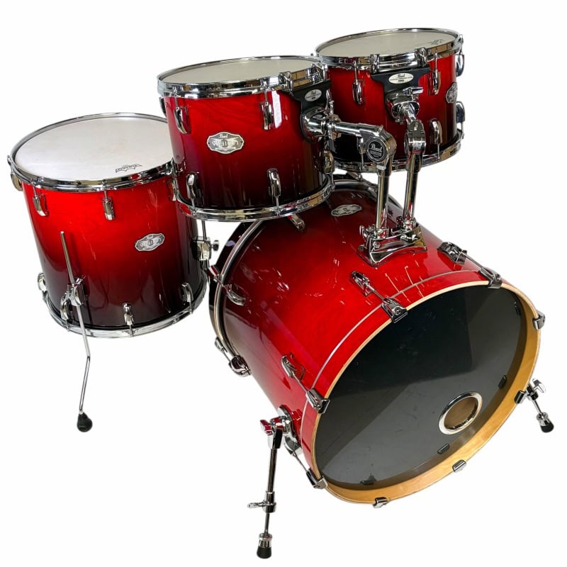 Red drum kit with cymbals and hardware for professional drumming. Perfect for drummers and music ent.