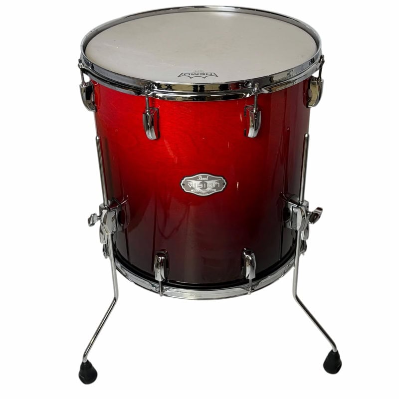 Red snare drum for professional drumming and percussion. Perfect for studio and live performances.
