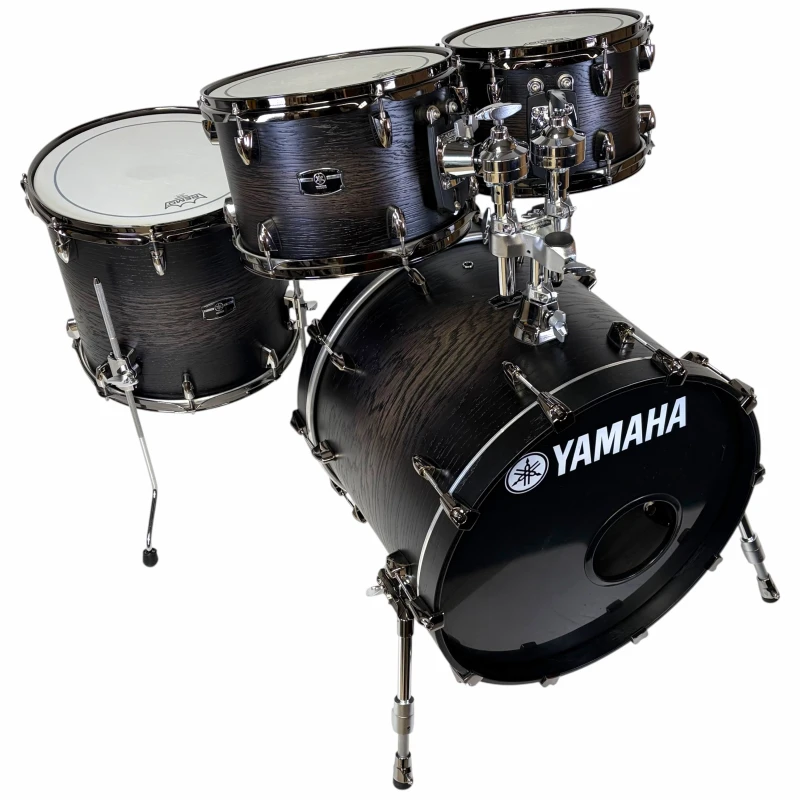 Yamaha drum kit with black finish, perfect for professional drummers and studio use. High-quality pe.