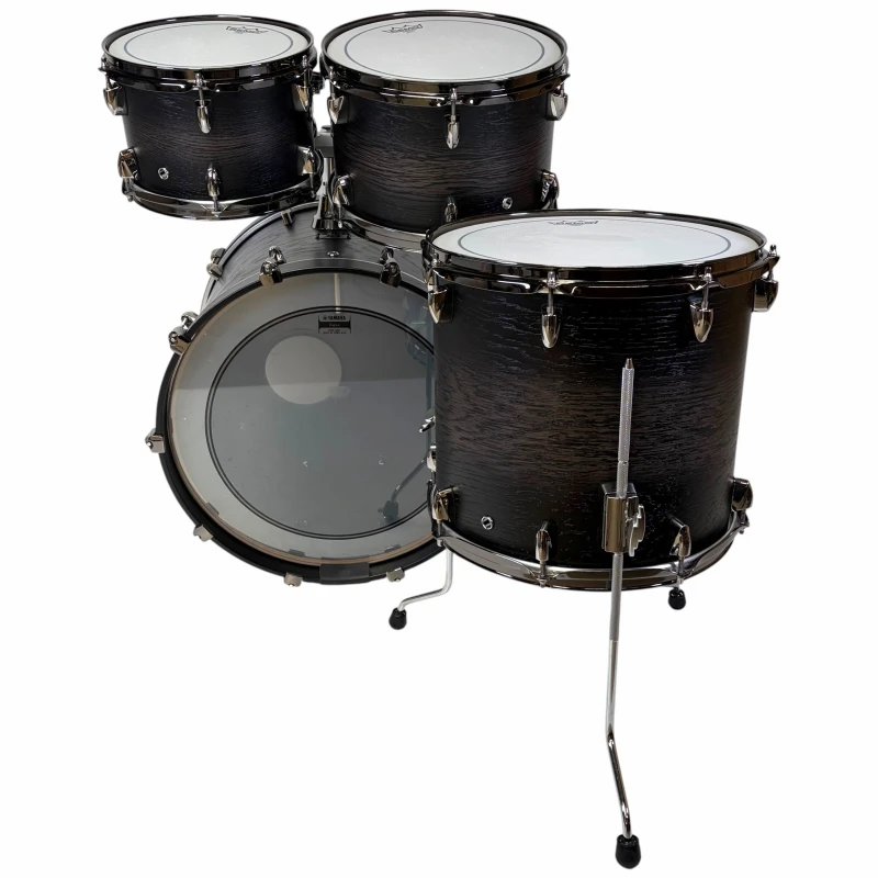 Professional black drum kit with bass, toms, and snare for drumming enthusiasts.