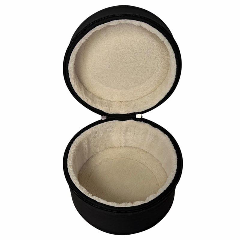 Soft drumstick case with plush interior for protection and storage.