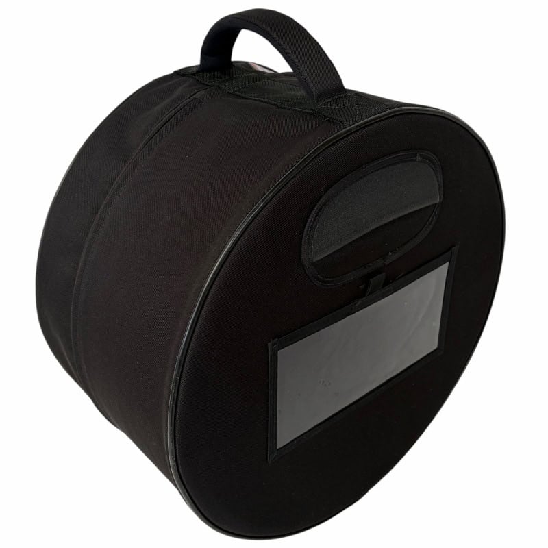 Portable electronic drum practice pad with display and handle for drummers.
